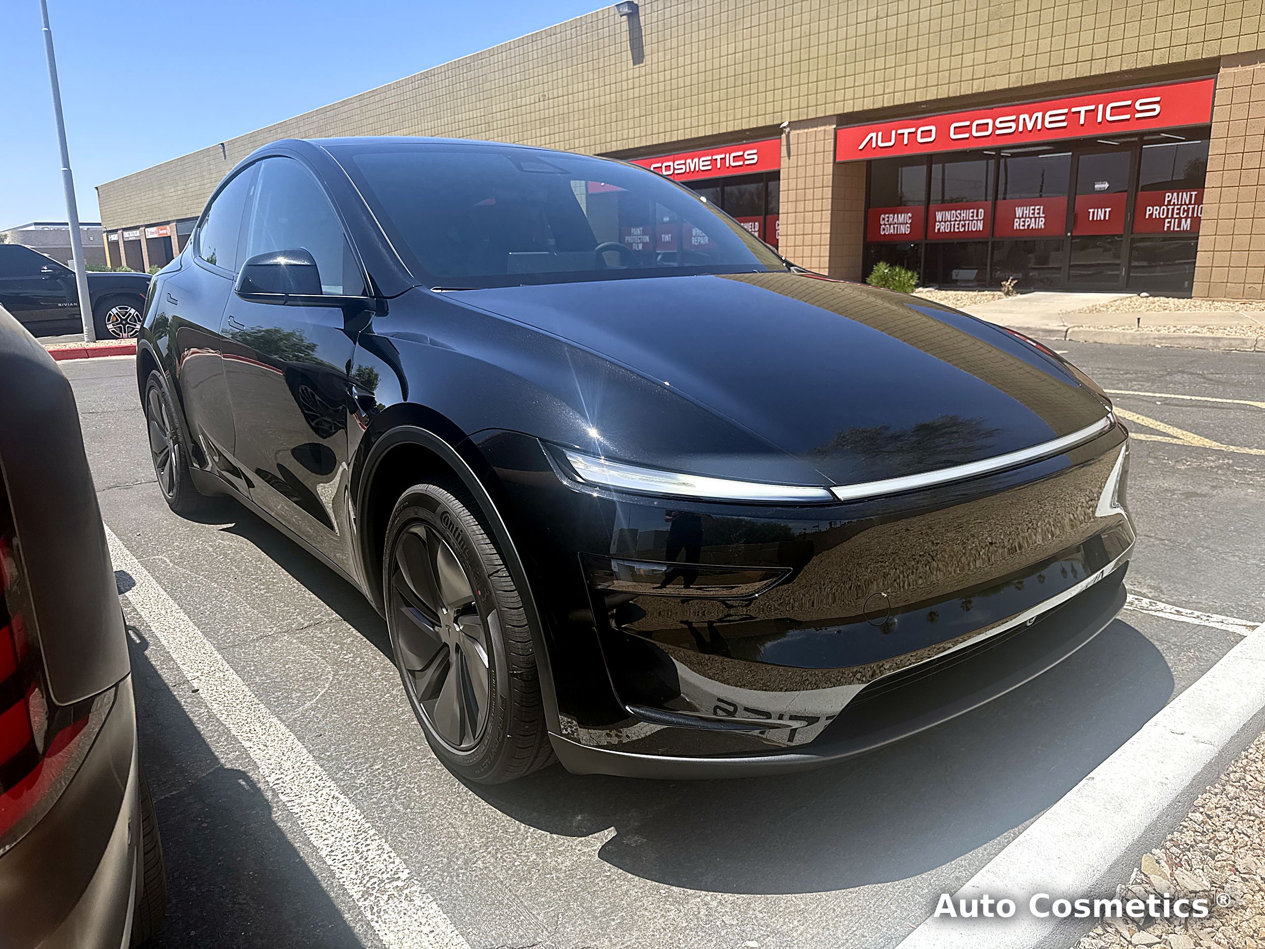 Tesla Model Y with full front paint protection film at Auto Cosmetics in Chandler, Arizona